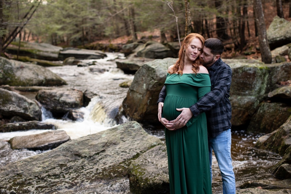 couple posing for maternity photos at enders falls